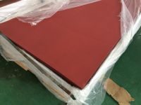 Red electrical insulating paper or paperboard