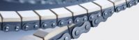 Roller Chains With Vulcanized Elastomer Profiles