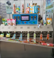 KEFAI Hot Kids drink  Bottle Shaped Pouch 8 Nozzles Filling Sealing Machine Factory Price From China