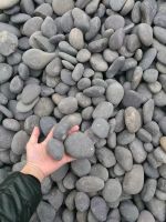 Grey pebbles, cobblestone, landscape rocks, decorative stone for garden decoration