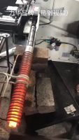 Low frequency induction heating machine for rebar preheating