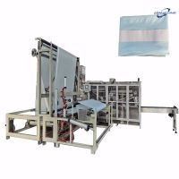 Nonwoven mulch folding machine