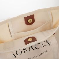 Embossed Leather Patch Canvas Tote Bag