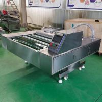 Continuos Vacuum Packing Machine