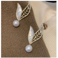 mother of pearl brooches