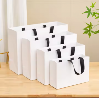 Custom Recyclable Kraft Paper Bag with Handle for Packaging Shopping Promotion and Gifts Featuring Your Own Logo