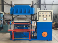 Plate vulcanizing press