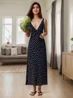 European and American style women's clothing: Romantic, retro and modern deep V-necked dress with polka dots, sleeveless, backless, long dress.