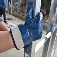 Exporting 77+ countries Canvas safety cuff Smooth heavy Blue Nitrile coating Fully dipped thumb mining oil resistant glove From China