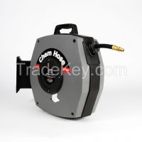 Retracting chemical hose spray reel