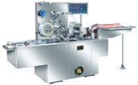 Automatic cellopane over-wrapping machine