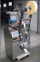 Screw packaging machine