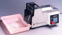 test strip cutter, dispenser, sealer