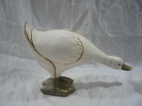 polyresin duck in leather look