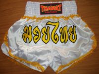 Muay Thai shorts white with tribals gold