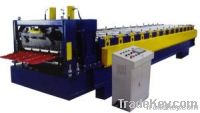 Tile roof panel forming machine