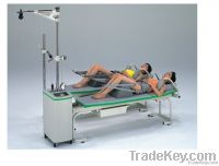 microcomputer controlled physical therapy traction bed