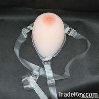 Unilateral teardrop silicon breast form for mastectomy with strap