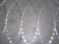 Razor type barbed wire mesh