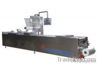 Fully automatic continuous tension vacuum packing machine