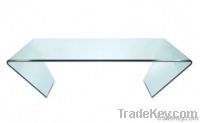 Curved glass coffee table