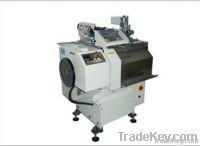 High speed automatic tag stringing machine