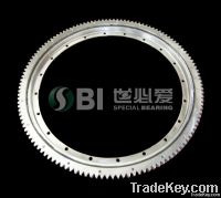 Single row four point contact ball bearing, with external gear &amp; flange