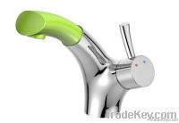 Single handle basin mixer with pull out spray