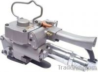 Pneumatic strapping tool, pneumatic strapping machine, pneumatic machin