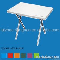 Folding plastic table