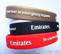 Embossed silicone wristband with white silk print logo