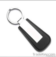 men metal keychain which black leather
