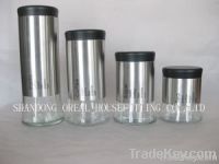 four round glass bottles set with coating