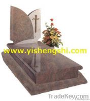 brown stone monument with plastic flower