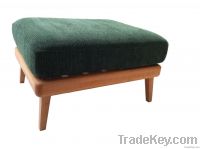 Ottomans with green cushion