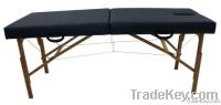 Wooden massage therapy table