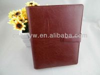 red brown notebook of cow leather