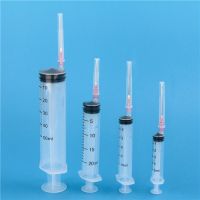 Disposable syringe with needle