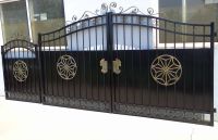 Wrought iron gate adornment door