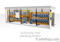 Automated Pad Metering Station