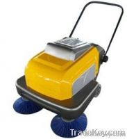Manual walk behind sweeper