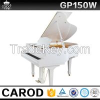 white baby grand piano 