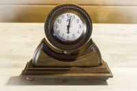 Desk wooden alarm clock with hand carved pattern.