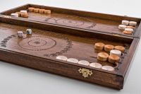 Wooden backgammon with hand carved pattern. 