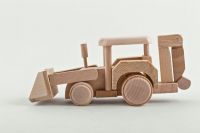 Wooden tractor for a boy.