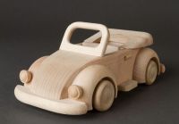 Children&amp;apos;s wooden toy car in retro style for play and creativity.