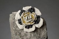 Handmade leather brooch in the form of a flower