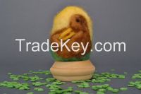 Egg on a wooden holder