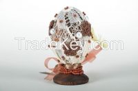 Wooden egg on stand