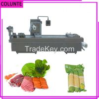 Vacuum food packing machine